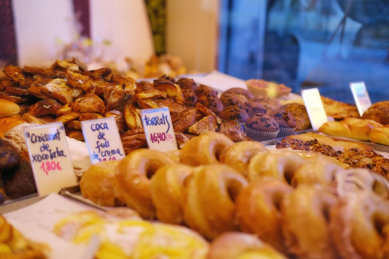 a store filled with lots of fresh pastries