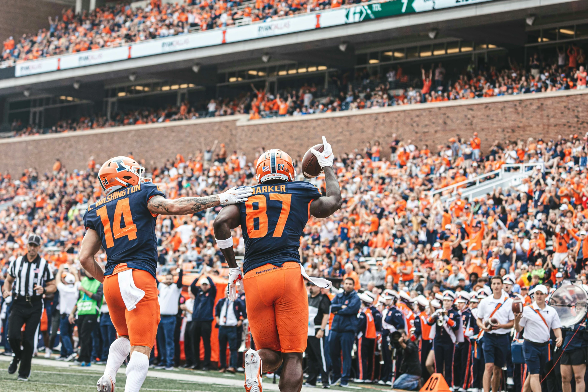 an image of football players congratulating each other