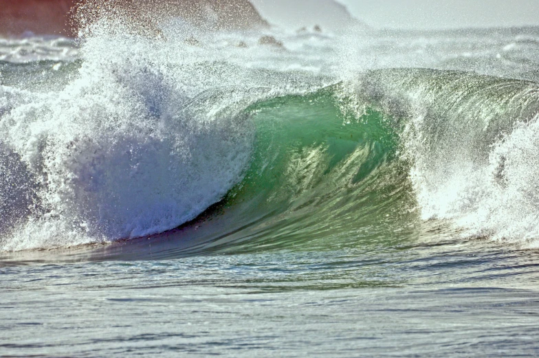 a person riding a wave in the water