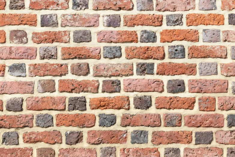 the wall made from bricks with several small bricks