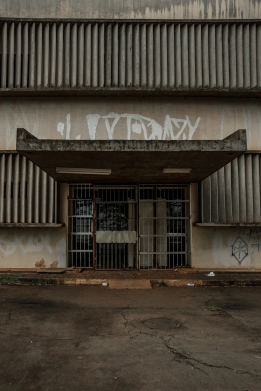 the door to a parking garage is covered in graffiti