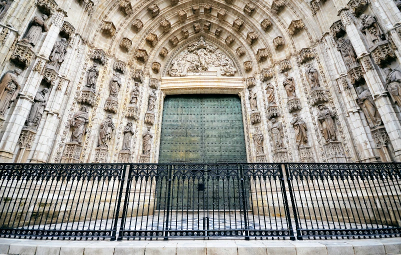 an ornate arch entrance in an old building