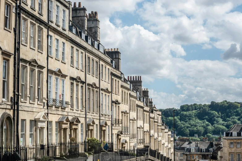 a row of houses next to the water