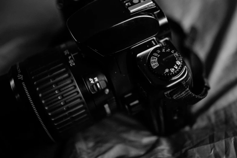 a camera is shown sitting on a pillow