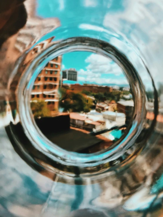 a circular image is seen through some glass