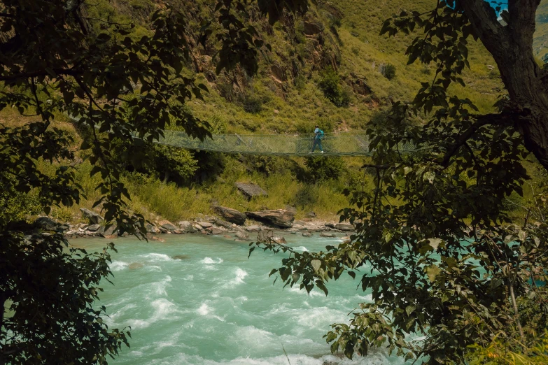 a view of a river that has white water