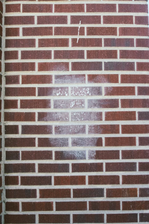 a brick wall painted in white paint