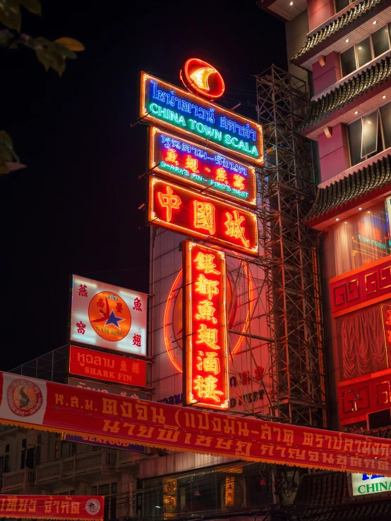 an image of the neon lights and sign in an asian street