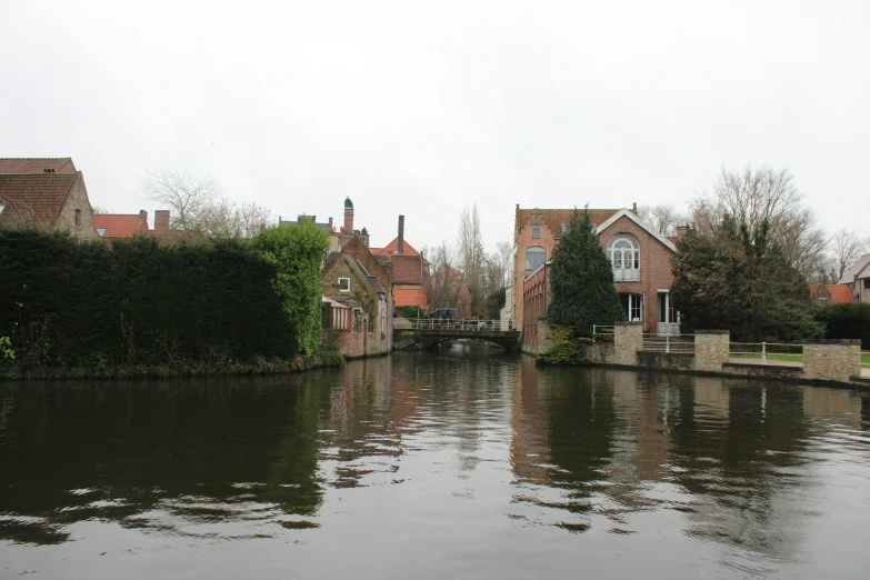 a waterway lined with houses is shown in the foreground