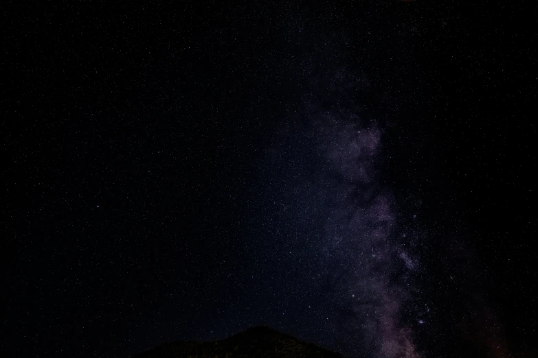 an image of a mountain at night time