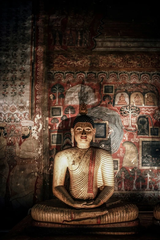 a close up of a person sitting in a meditation position