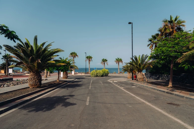 a quiet street leading down to the beach