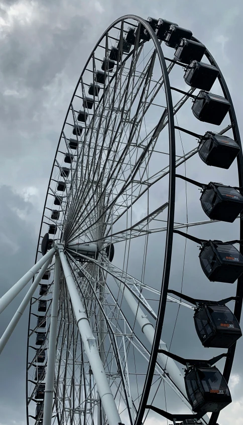 a ferris wheel sitting high in the air