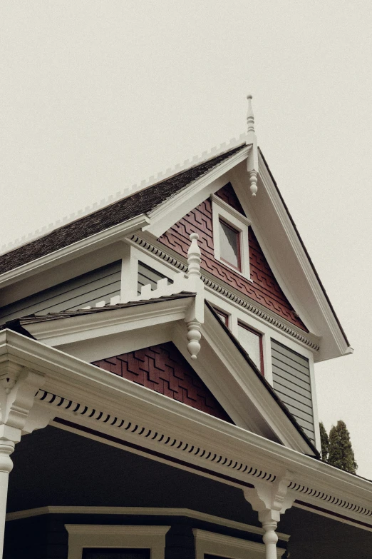 red and white house with a black roof