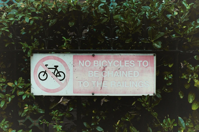 a sign that says no bicycles to be  to the buildings