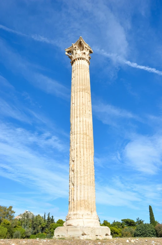 a tall obelisk with a statue on top