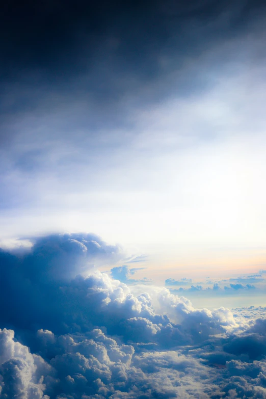 a sky with some clouds and yellow and blue