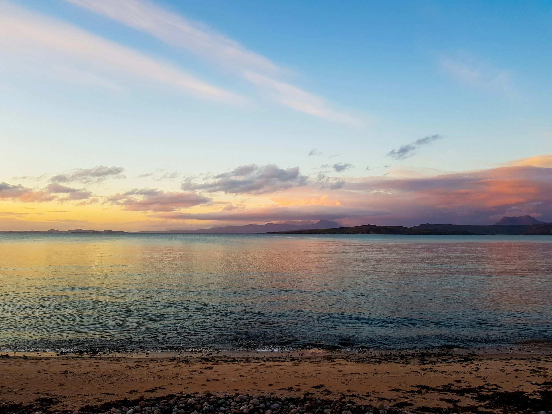 the sky and sea in a very pretty place