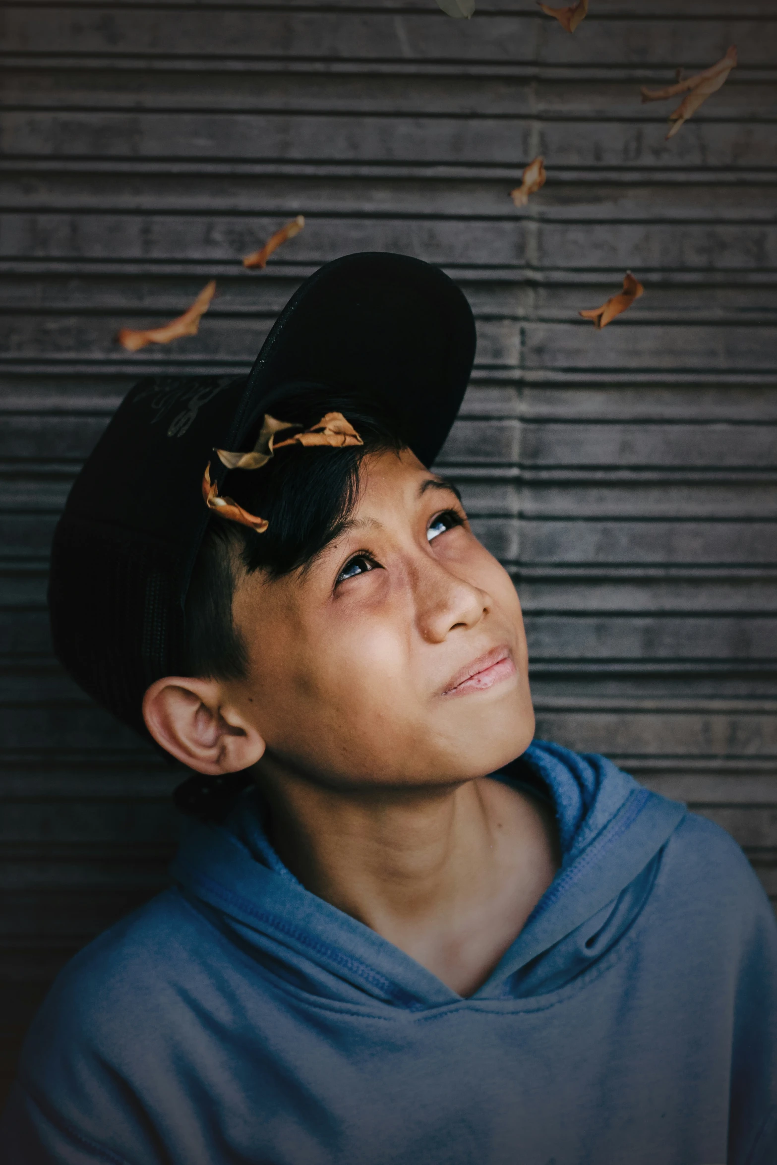 a woman wearing a hat with birds all over her