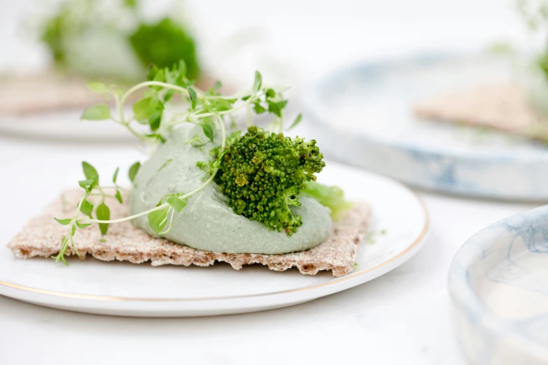 a plate with some food on it near plates