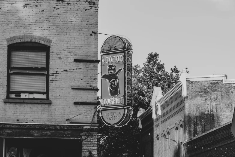 an old fashion clock sits on a brick building