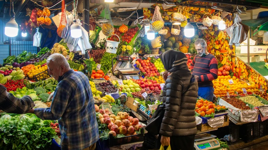 the vendors are waiting to buy their produce