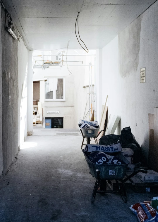 an empty, open room filled with items and furniture