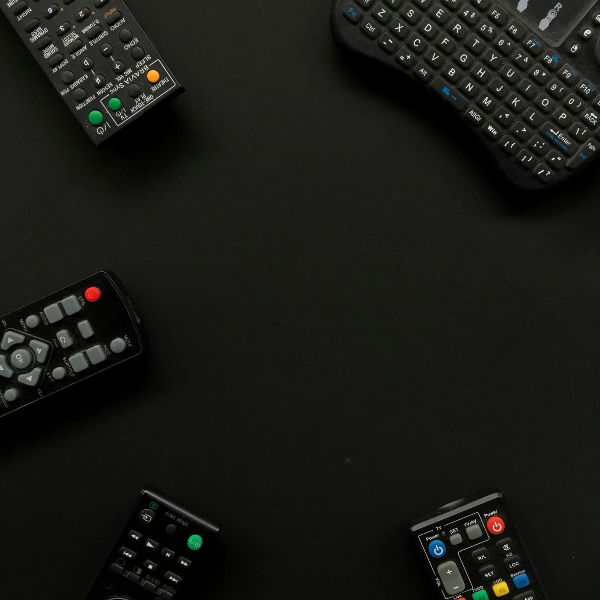 remote controls arranged in an array for various different purposes