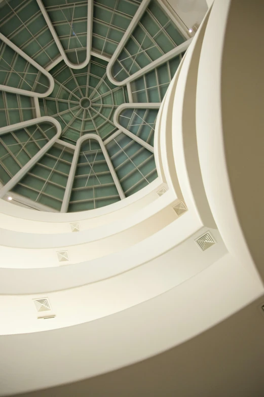 the ceiling in a building with round decorations