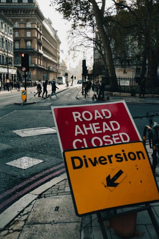 the sign shows a road ahead and says diversion