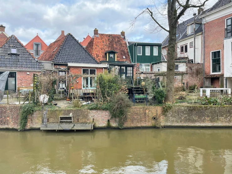 houses on the bank of a canal in europe