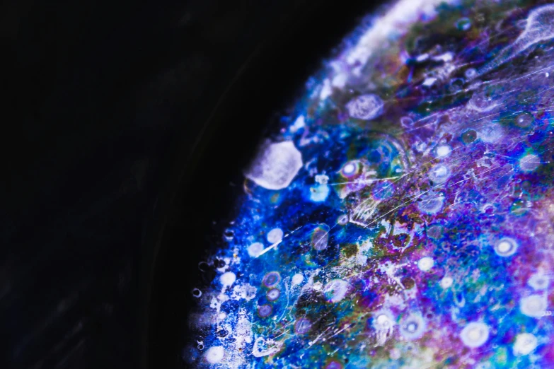 blue, purple and black paint with bubbles