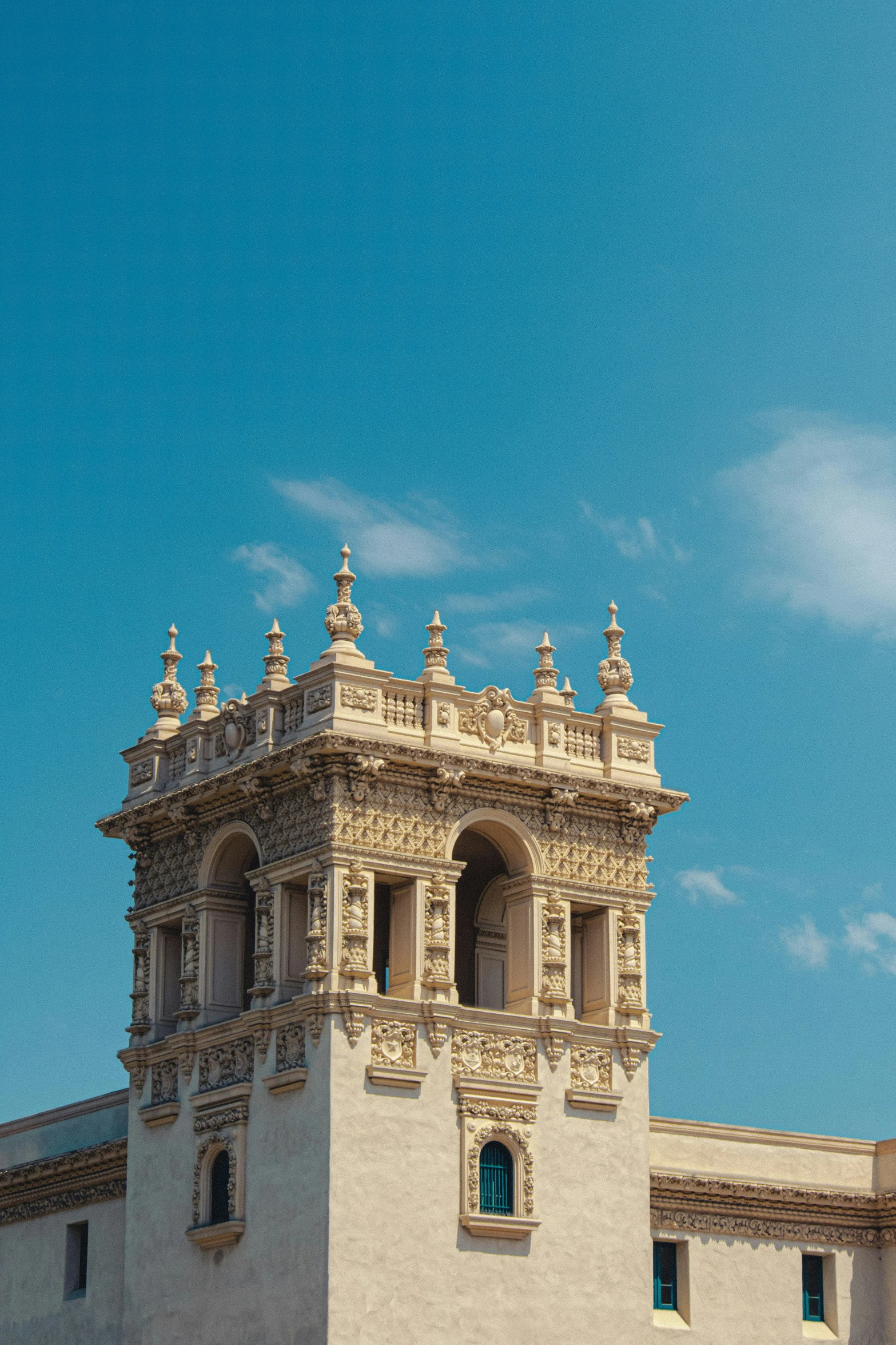 a large white tower with windows sitting on top of it