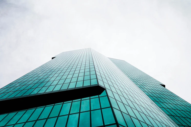 a high rise building with lots of glass windows