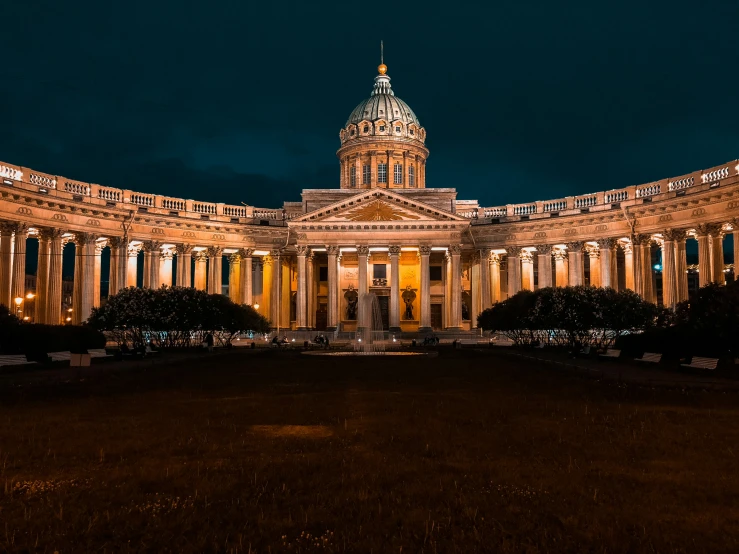 a building with a big dome lit up at night