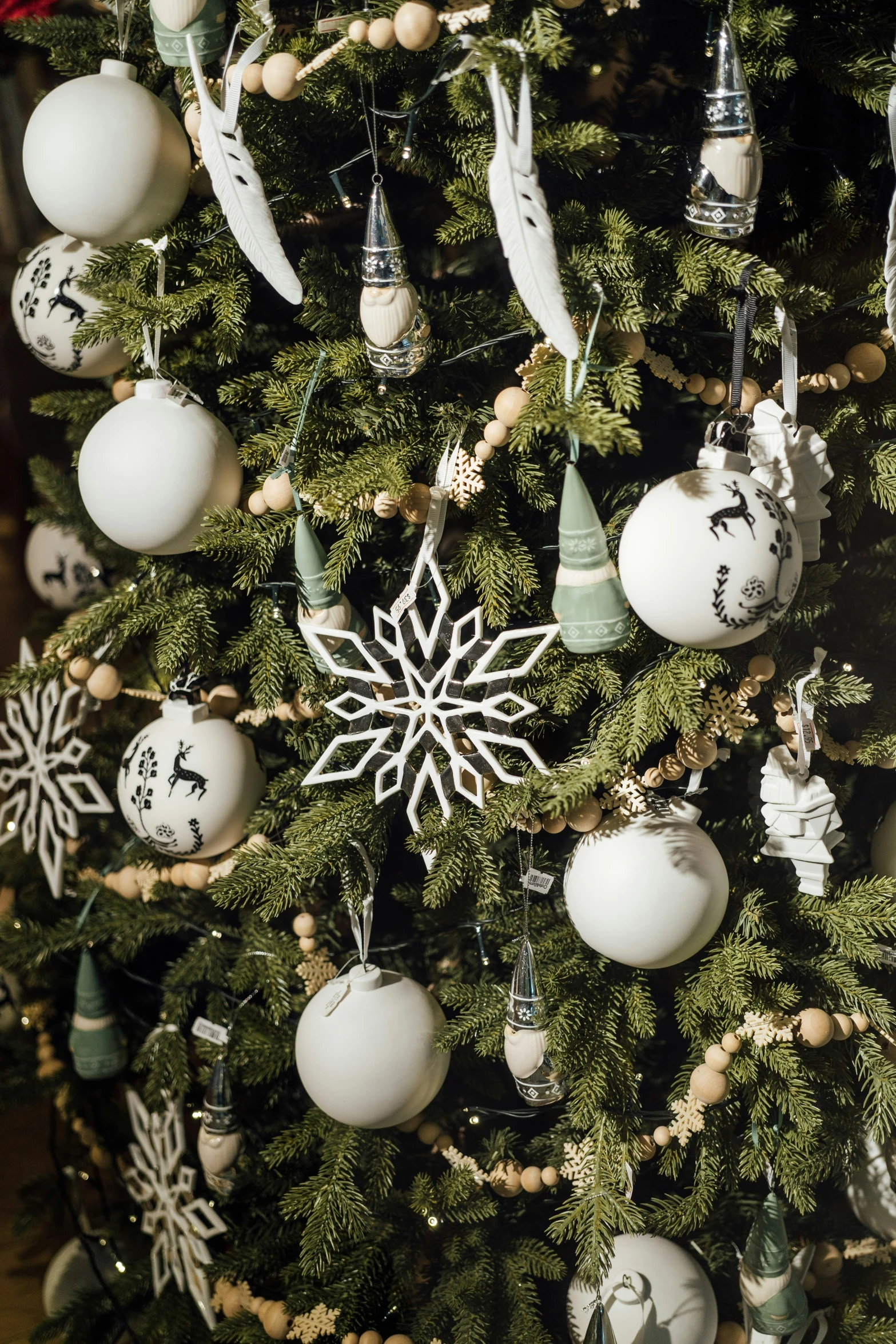 there are ornaments hanging from a christmas tree