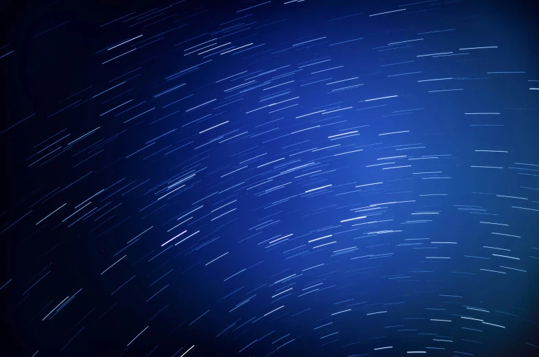 a background with lines and stars in the sky