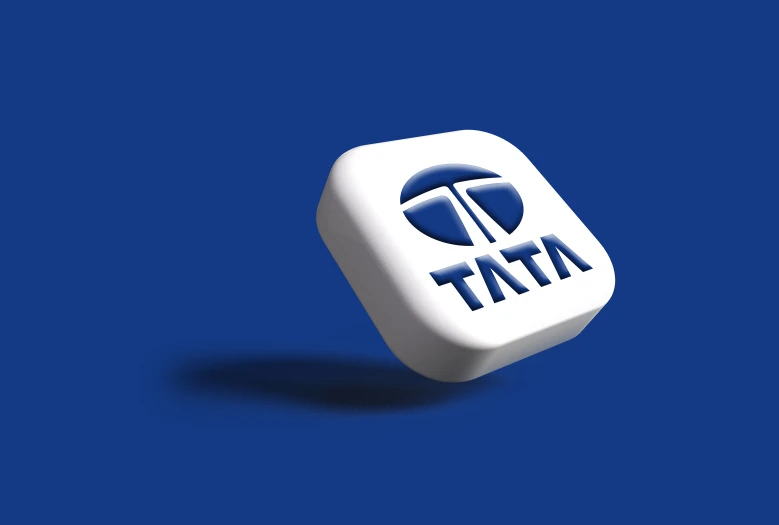 the white dice that says tatta on it