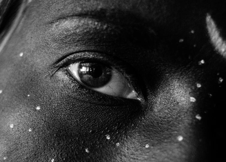 an image of a man's face with dots covering the top