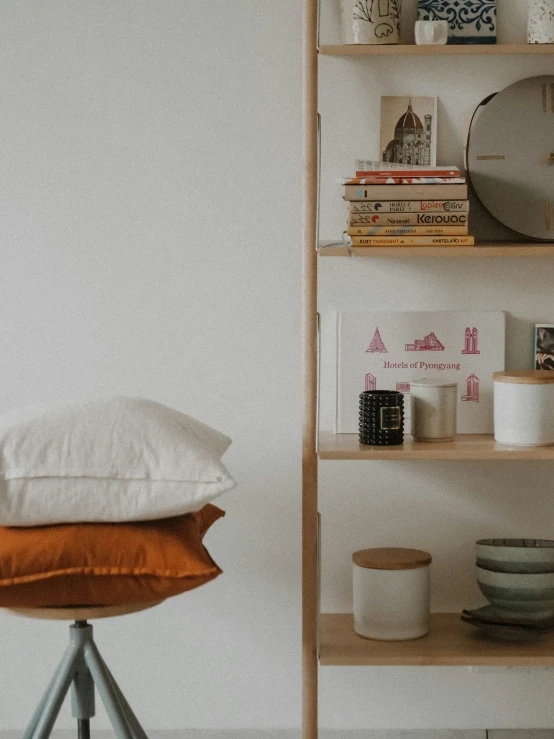 a small shelf with many items on top of it