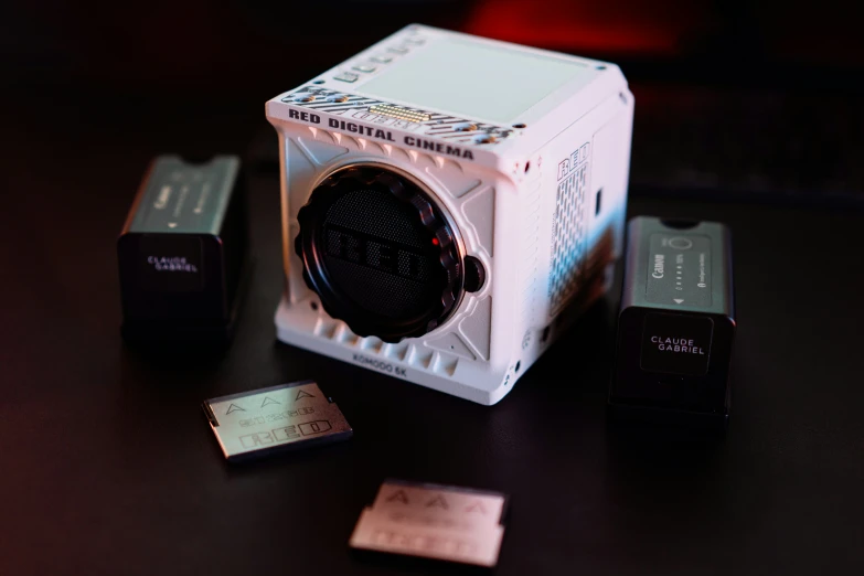 a camera sitting on top of a wooden table