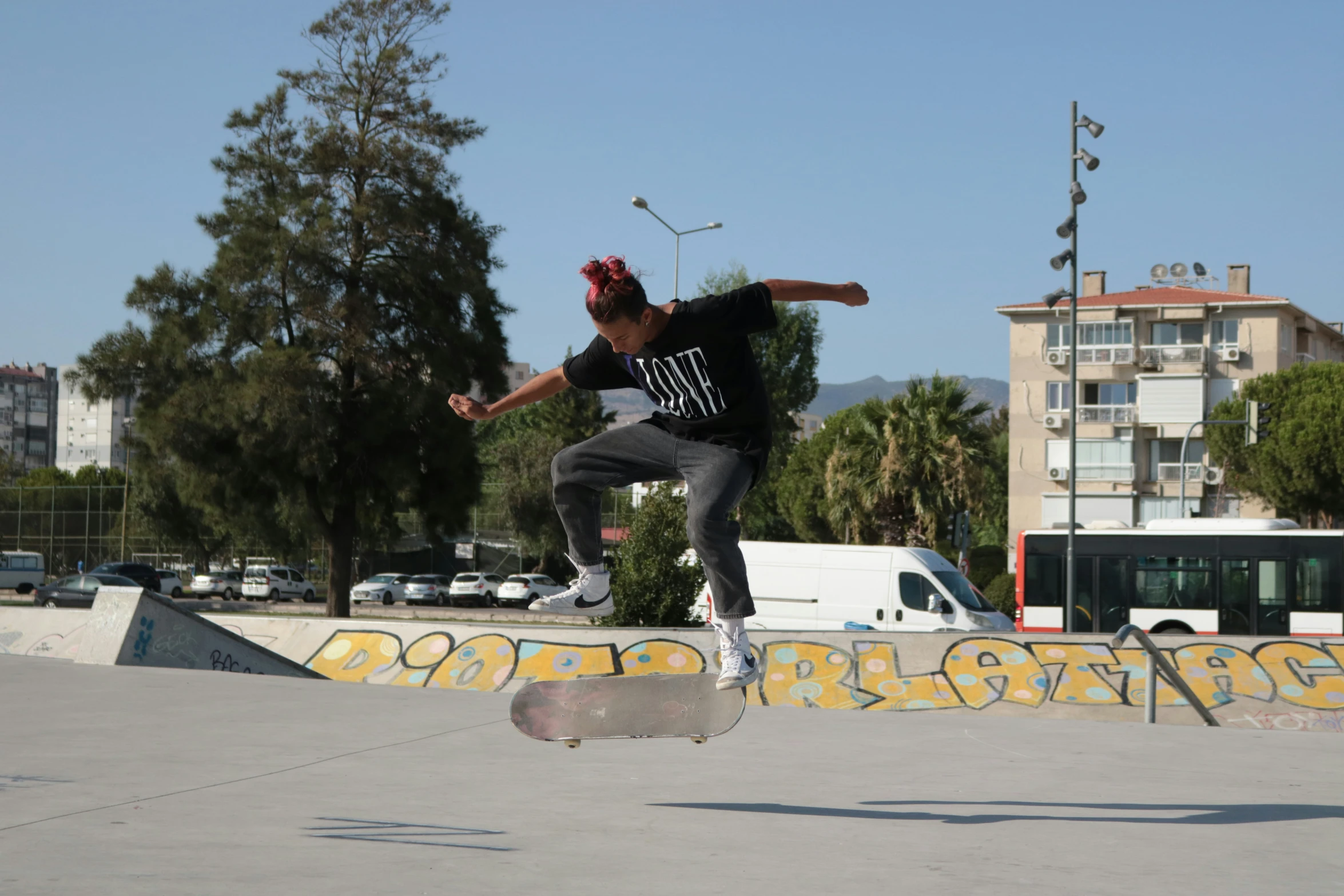 a young man doing a trick on a skateboard