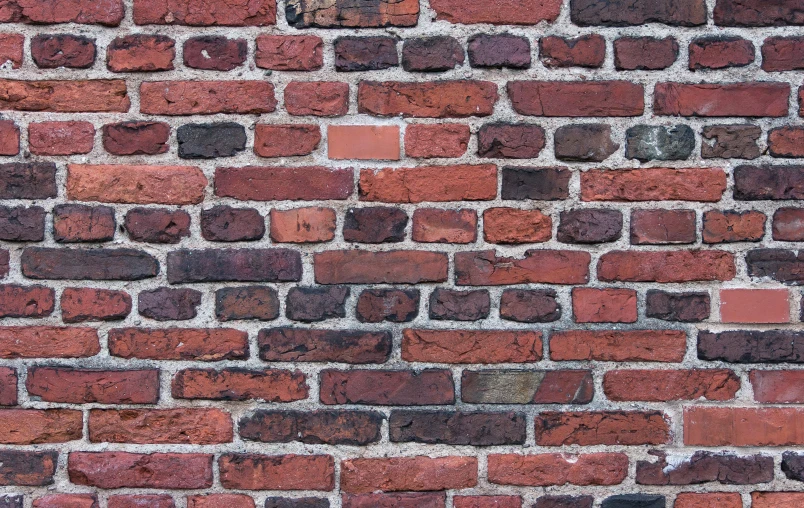 a brick wall is shown in color and texture