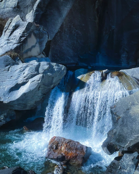 there is water in the middle of a waterfall