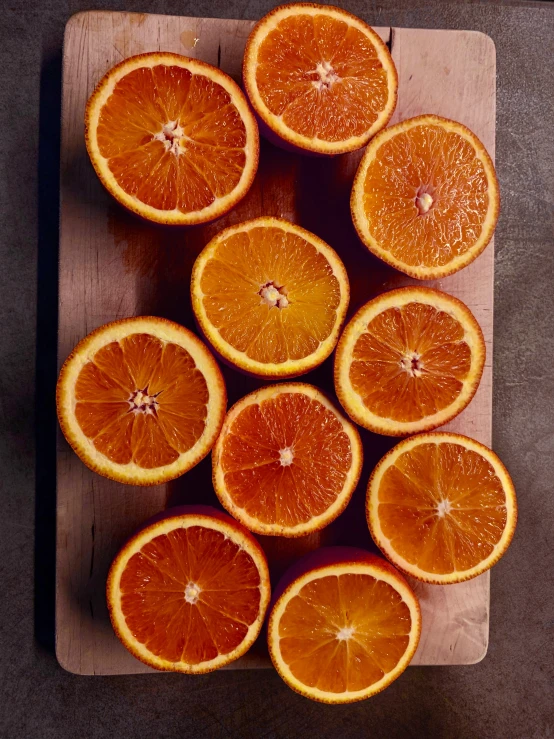 an overhead s of oranges on a  board