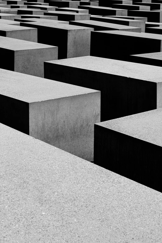 black and white pograph of rows of cubes in front of each other