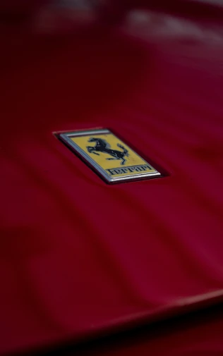 a red sports car with the ferrari badge on it