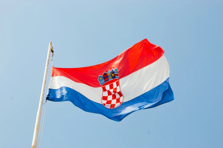 an croatia flag flying from a flag pole