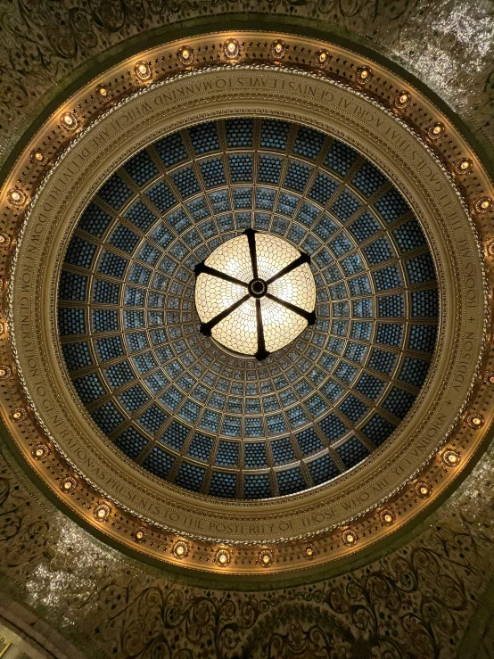 a view up at the round ceiling in the building