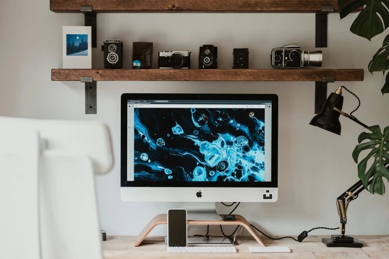 a desk that has some devices on it